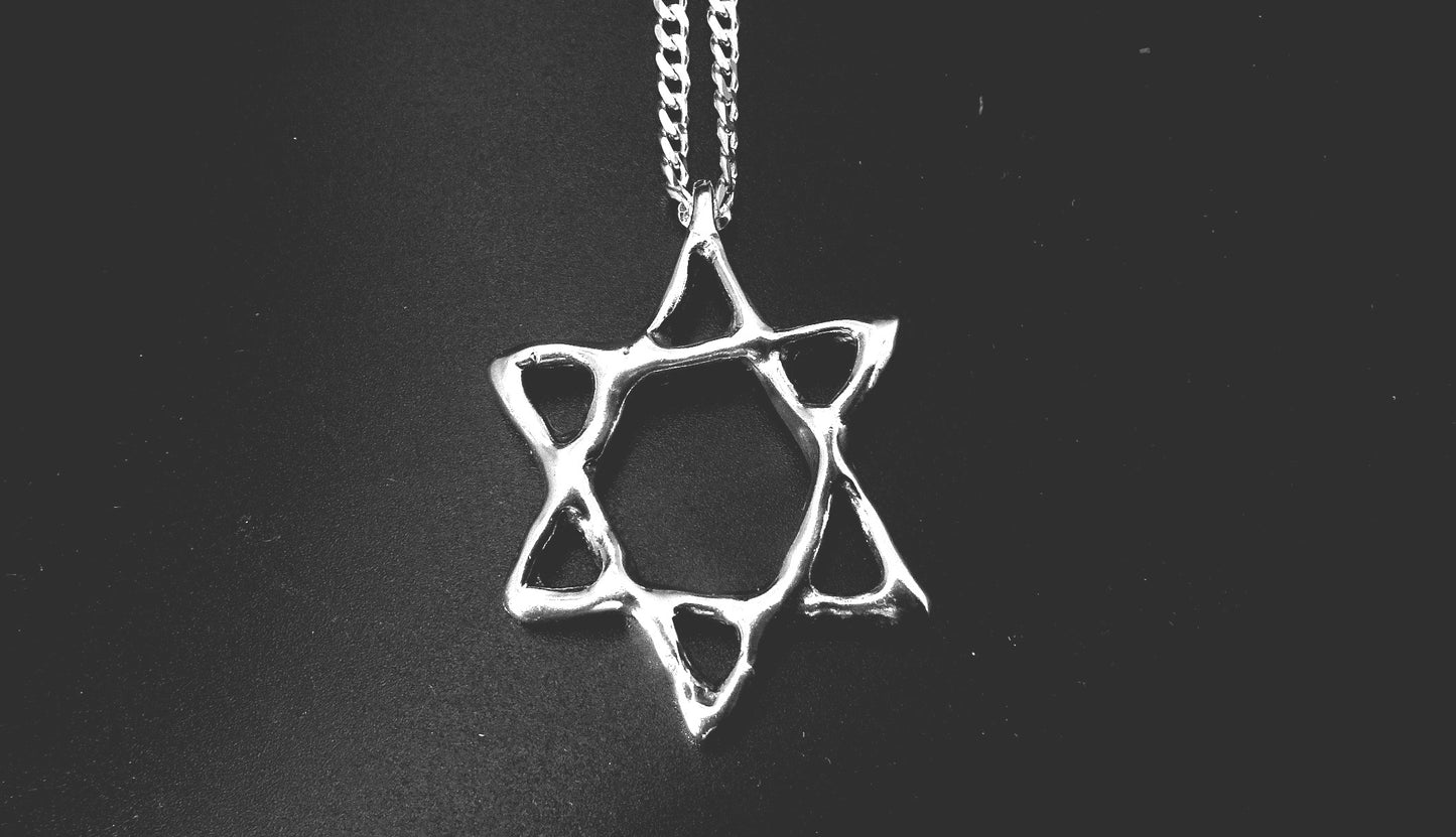SIX POINT STAR ABSTRACT PENDANT-STERLING SILVER (92.5) image 0