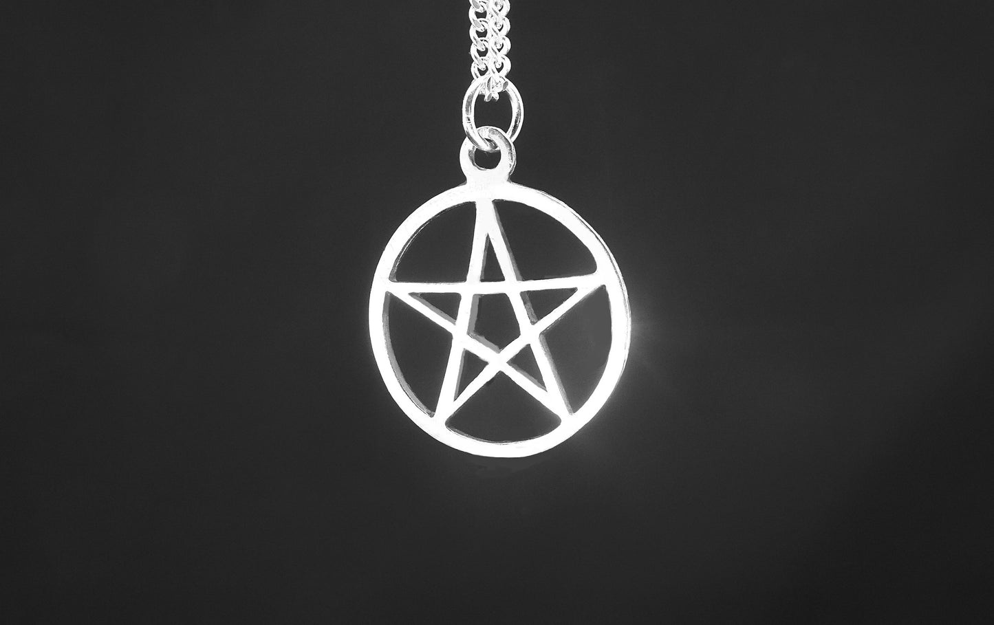 OPEN STAR PENDANT IN CIRCLE-STERLING SILVER image 0